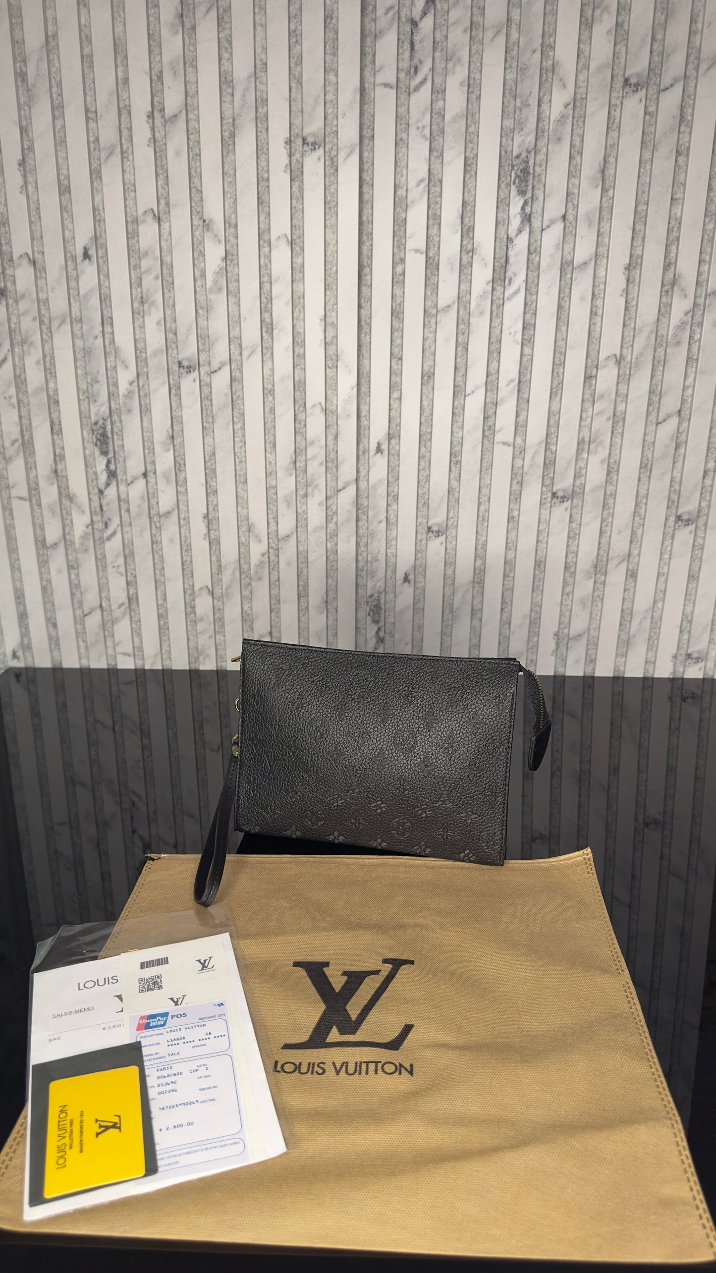 Louis Vuitton Pochette Monogram Empreinte Nappa Leather